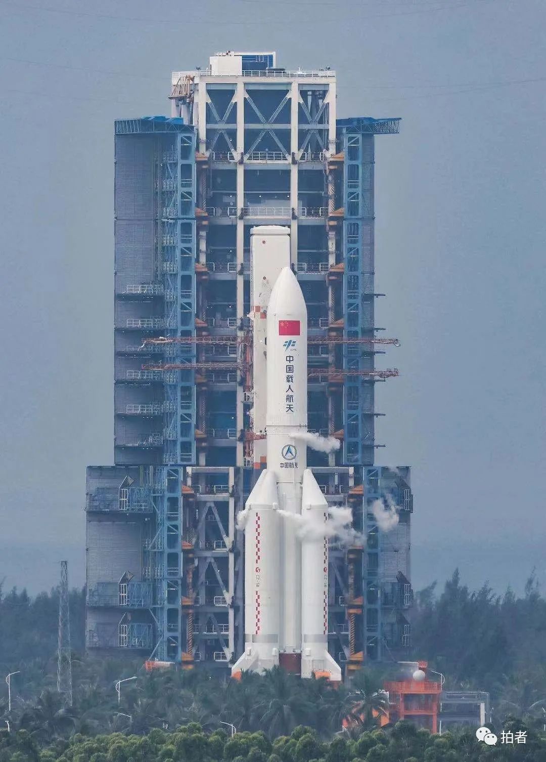 记者手记：心有坚守 逐梦太空